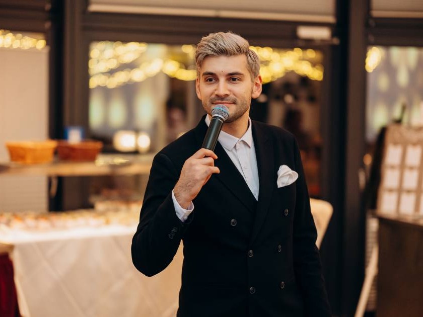 Presenter hosting a formal gala